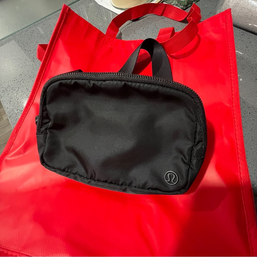 OG Lululemon Everywhere Belt Bag & red shopping tote
